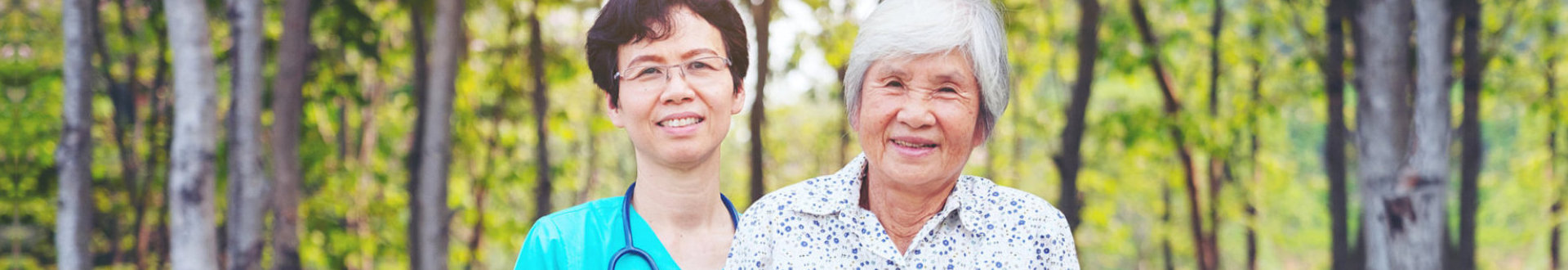 adult caregiver with senior woman