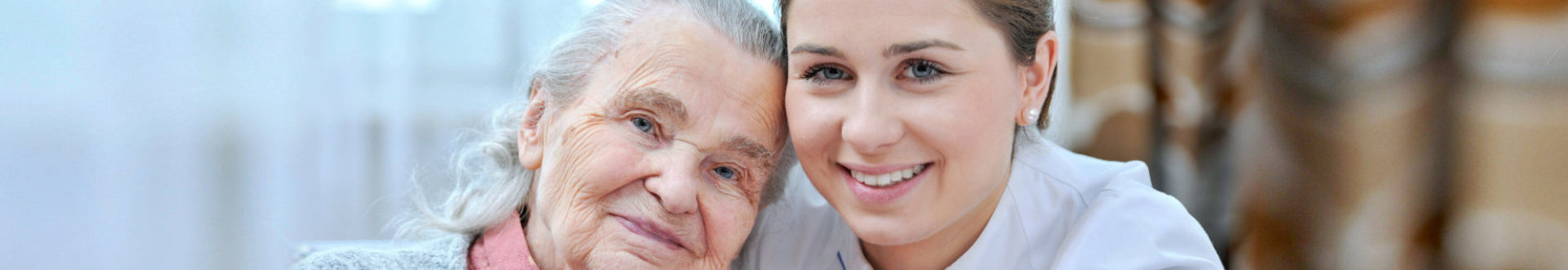 senior woman with female caregiver